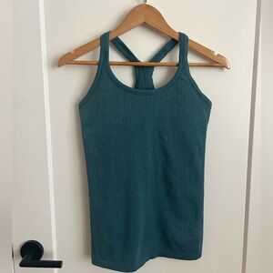 Ebb to flow tank with built in bra. Great for low impact activities